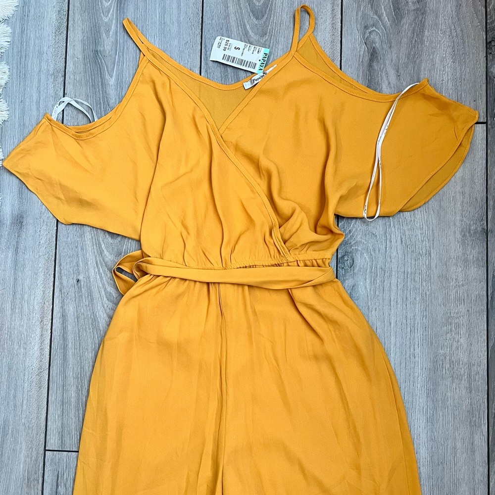 Mustard color cold shoulder jumpsuit in size small